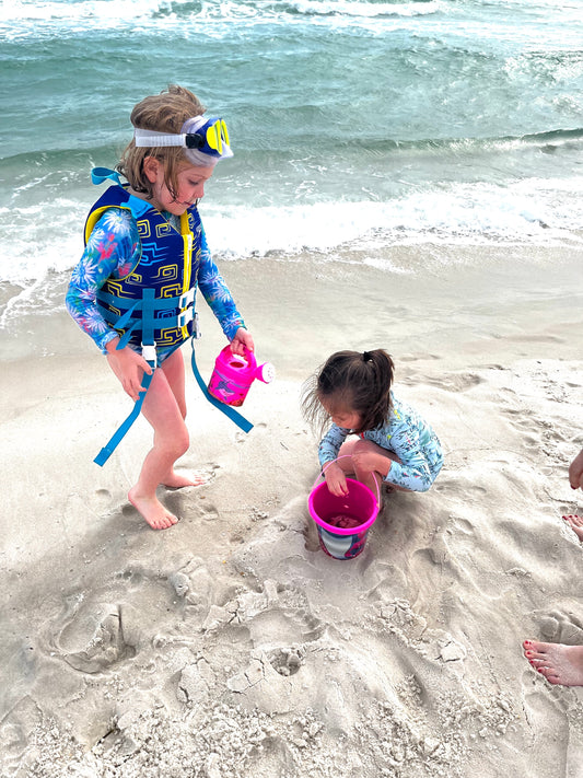 children playing on the beach